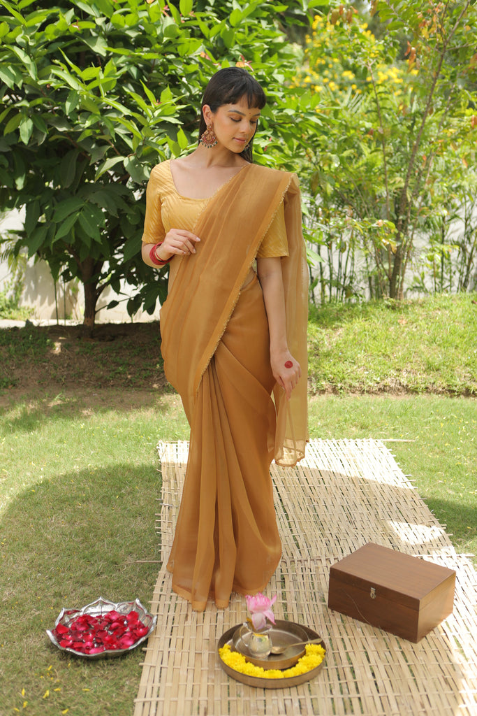 MADHURYA-GOLD Tissue Zari Saree stylefables   